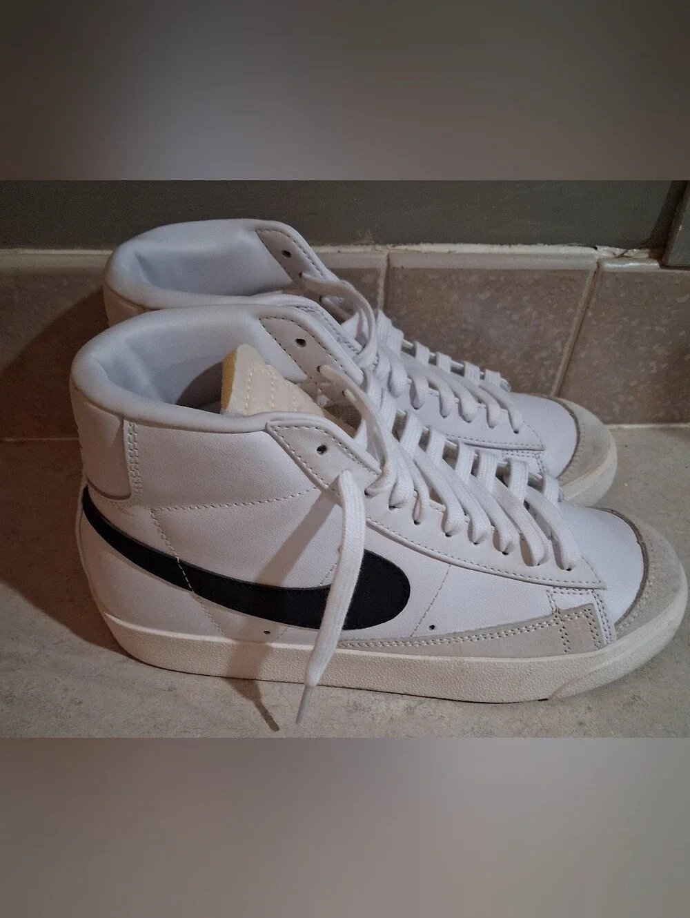 Nike Blazer Mid '77 vintage sneakers, bold black leather Swoosh